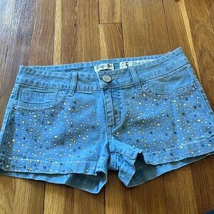Indigo Rein rhinestone shorts.